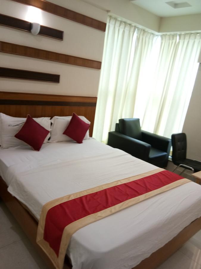 Hlv Grand Inn Bangalore Exterior foto
