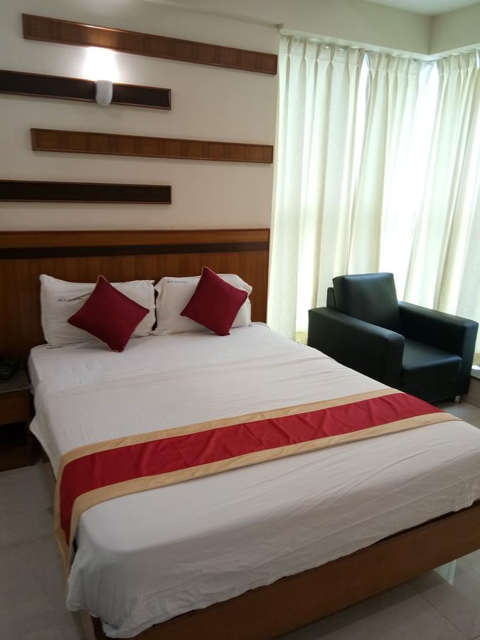Hlv Grand Inn Bangalore Exterior foto
